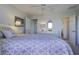 Bedroom with a queen bed and access to a bathroom at 32 Marsh Island (4 Shares) Ln, Isle of Palms, SC 29451