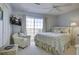 Bedroom with a queen bed and access to a balcony at 32 Marsh Island (4 Shares) Ln, Isle of Palms, SC 29451