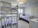 Bedroom with twin over full bunk beds at 32 Marsh Island (4 Shares) Ln, Isle of Palms, SC 29451