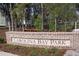 Carolina Bay Park entrance, brick signage, landscaping, welcoming atmosphere at 4135 Collins Dr, Charleston, SC 29414
