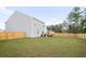 Spacious backyard with a wooden fence at 671 Silver Spruce St, Summerville, SC 29486