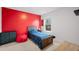 Red-accented bedroom with a twin-sized bed at 671 Silver Spruce St, Summerville, SC 29486