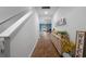 Bright foyer with hardwood floors, leading to the living room and staircase at 671 Silver Spruce St, Summerville, SC 29486
