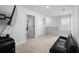 Spacious loft area with carpeted floors and plenty of natural light at 671 Silver Spruce St, Summerville, SC 29486