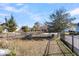 Landscaped front yard with trees and fencing at 712 Quintan St, Summerville, SC 29486