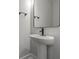 Small bathroom with pedestal sink and black matte faucet at 758 Maynard Ln, Summerville, SC 29486