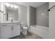 Bathroom with gray herringbone tile and white vanity at 758 Maynard Ln, Summerville, SC 29486