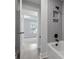 Bathroom with gray herringbone tile and white vanity at 758 Maynard Ln, Summerville, SC 29486