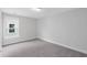 Well-lit bedroom with large window and grey carpet at 758 Maynard Ln, Summerville, SC 29486