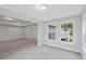 Spacious bedroom with two windows and grey carpet at 758 Maynard Ln, Summerville, SC 29486