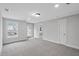 Large bedroom with door to private balcony and carpet at 758 Maynard Ln, Summerville, SC 29486