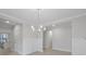 Bright dining room with hardwood floors and modern chandelier at 758 Maynard Ln, Summerville, SC 29486