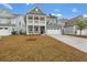 Two-story craftsman style home with gray siding, white trim, and a large front yard at 758 Maynard Ln, Summerville, SC 29486
