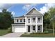 Two-story house with grey siding, white trim, and a black roof at 758 Maynard Ln, Summerville, SC 29486