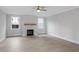 Living room features hardwood floors and a fireplace with a wood mantle at 758 Maynard Ln, Summerville, SC 29486