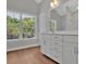 Bathroom with white vanity and brown tile floor at 780 Maynard Ln, Summerville, SC 29486