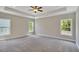 Spacious main bedroom with neutral walls, carpet, and ceiling fan at 780 Maynard Ln, Summerville, SC 29486