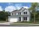Two-story light blue house with dark gray accents and a two-car garage at 780 Maynard Ln, Summerville, SC 29486