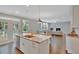 Open concept kitchen features a large island with granite countertops and stainless steel appliances at 780 Maynard Ln, Summerville, SC 29486