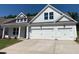 Two-story home with white siding, three-car garage, and landscaping at 782 Maynard Ln, Summerville, SC 29486
