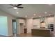 Open kitchen with island, stainless steel appliances, and hardwood floors at 782 Maynard Ln, Summerville, SC 29486