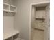 Bright laundry room with built-in storage and bench at 782 Maynard Ln, Summerville, SC 29486