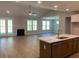 Spacious living room with hardwood floors, fireplace, and large windows at 782 Maynard Ln, Summerville, SC 29486