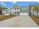 Two-story home with a gray exterior, white trim, and a two-car garage at 790 Maynard Ln, Summerville, SC 29486
