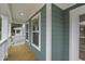 Wooden deck with white railings and two windows at 790 Maynard Ln, Summerville, SC 29486
