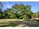 Large lot with mature oak tree and open grassy area at 8146 N Highway 17, McClellanville, SC 29458