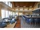 Upscale bar and lounge area with blue seating at 102 High Hammock Villas, Seabrook Island, SC 29455