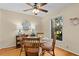 Dining area with hardwood floors and wicker furniture at 102 High Hammock Villas, Seabrook Island, SC 29455