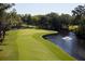 Aerial view of a scenic golf course with a water feature at 102 High Hammock Villas, Seabrook Island, SC 29455
