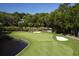 Golf course with a water feature and lush green fairways at 102 High Hammock Villas, Seabrook Island, SC 29455