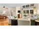 Spacious living room with hardwood floors, and access to balcony at 102 High Hammock Villas, Seabrook Island, SC 29455