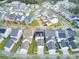 Aerial view of a large neighborhood with many houses at 1065 Oak Bluff Ave, Charleston, SC 29492