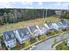 Aerial view of a street of houses with a park nearby at 1065 Oak Bluff Ave, Charleston, SC 29492