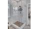 Large walk-in shower with glass enclosure and stone shower floor at 1065 Oak Bluff Ave, Charleston, SC 29492