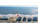 Aerial view of beachfront property near other houses and businesses at 108 Palmetto Blvd, Edisto Beach, SC 29438