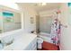 Bathroom with tub, shower, and vanity at 108 Palmetto Blvd, Edisto Beach, SC 29438