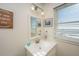Clean and bright bathroom with a vanity sink and modern fixtures at 108 Palmetto Blvd, Edisto Beach, SC 29438