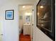 Small half bathroom with white vanity and toilet at 108 Palmetto Blvd, Edisto Beach, SC 29438