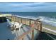 Oceanfront deck with seating and stunning ocean views at 108 Palmetto Blvd, Edisto Beach, SC 29438