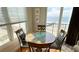 Cozy ocean view dining area with round table and chairs at 108 Palmetto Blvd, Edisto Beach, SC 29438