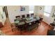 Formal dining room with large table and seating for eight at 108 Palmetto Blvd, Edisto Beach, SC 29438