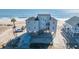 Elevated beachfront house with fenced area, parking, and ocean view at 108 Palmetto Blvd, Edisto Beach, SC 29438