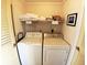 Stackable washer and dryer in small laundry room at 108 Palmetto Blvd, Edisto Beach, SC 29438