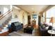 Spacious living area with hardwood floors, two sofas, and a coffee table at 108 Palmetto Blvd, Edisto Beach, SC 29438