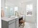 Elegant bathroom with double vanity, large mirror, and marble flooring at 1447 Clay Field Trl, Summerville, SC 29485