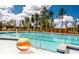Relaxing community pool with beach entry and colorful beach balls at 1447 Clay Field Trl, Summerville, SC 29485